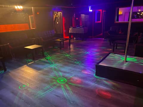 Neon Night Club with Private Play Rooms