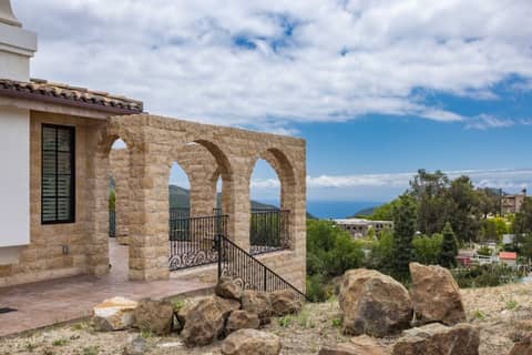 Stone Mediterranean Villa with Canyon Views