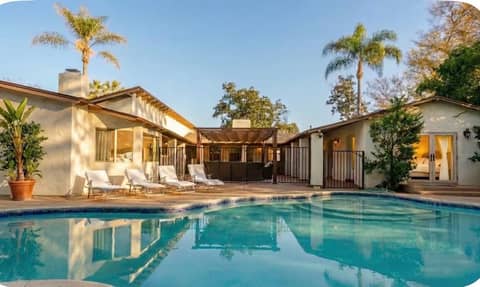 Spanish-Style Pool Home with Covered Patios
