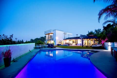Modern View Home with Glowing Floating Staircase
