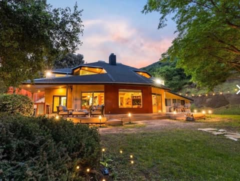 Canyon Retreat: Wood-and-Glass Main House