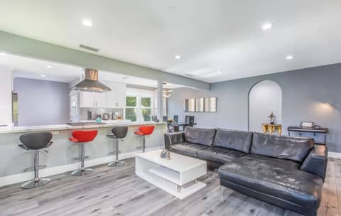 Modern Gray Pool Home with Open Kitchen
