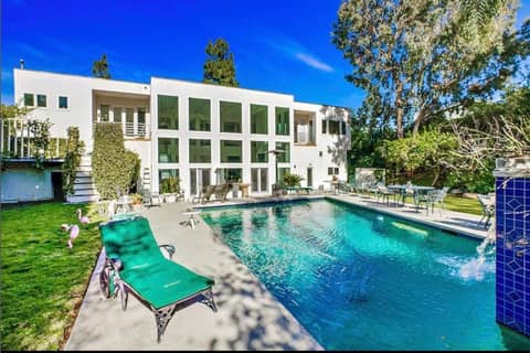 Glass-Walled White Modern with Pool and Home Theater